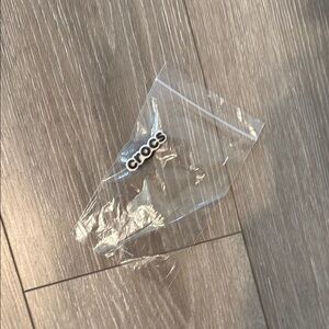 Crocs Black and White Logo Charm